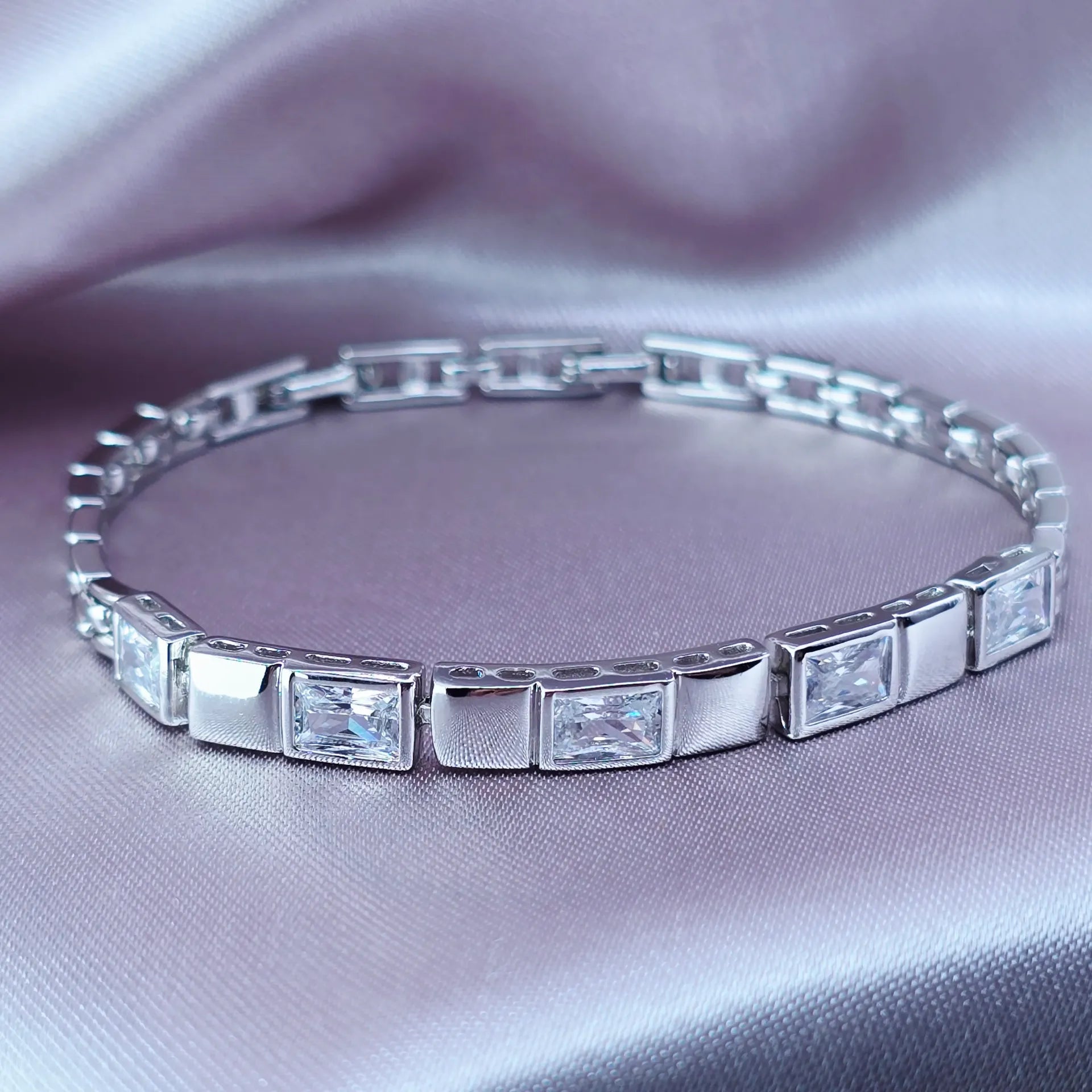 Baguette Stone Tennis Bracelet in Polished Silver Plate