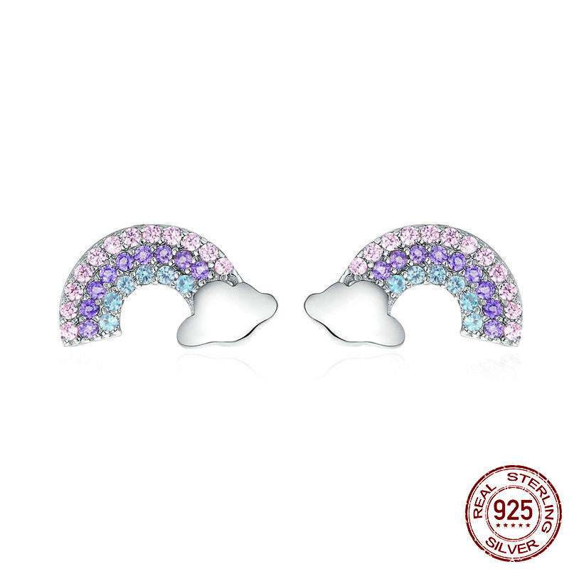 Rainbow-shaped earrings with colorful stones on a white background, featuring a 925 silver stamp.