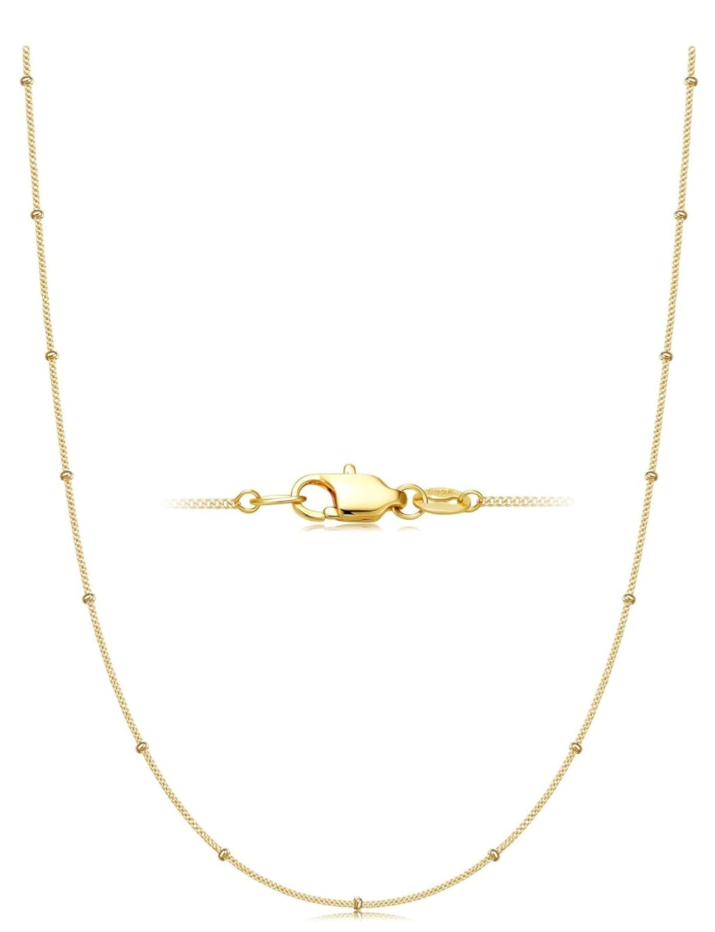 Gold necklace with a clasp on a white background