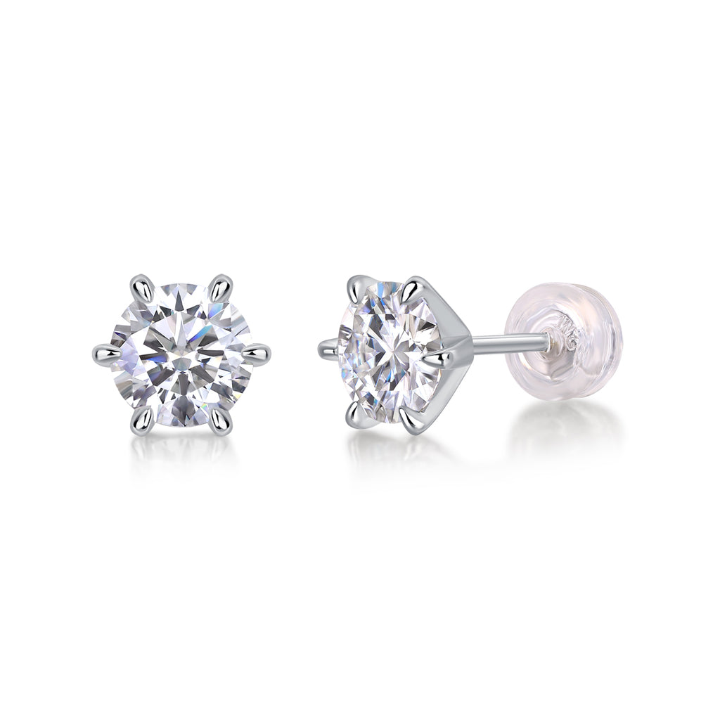 Pair of diamond stud earrings on a white background
