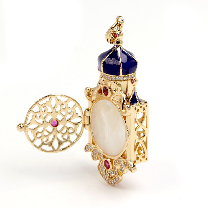 Decorative jewelry box with gold, blue, and red accents on a white background