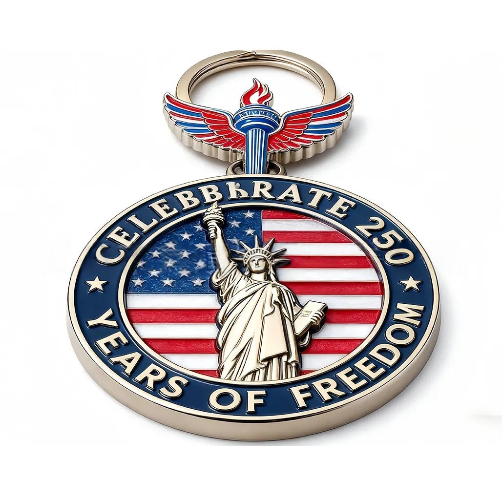 Keychain with Statue of Liberty design and 'Celebrate 250 Years of Freedom' text on a white background