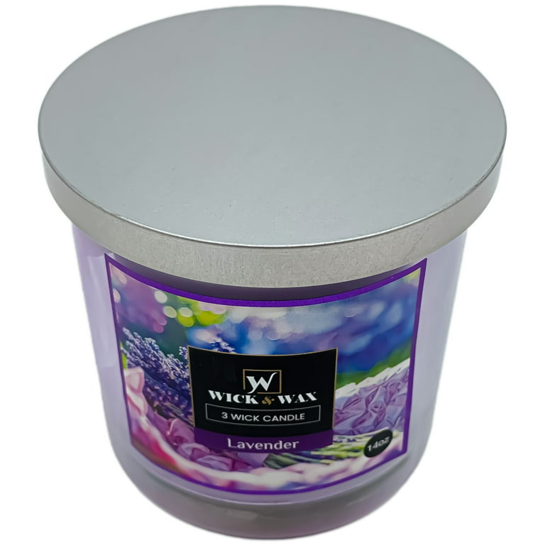 Candle with a silver lid and 'Wick & Wax' label on a white background