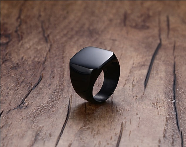 Men's matte black stainless steel square signet ring with an 18mm brushed finish.